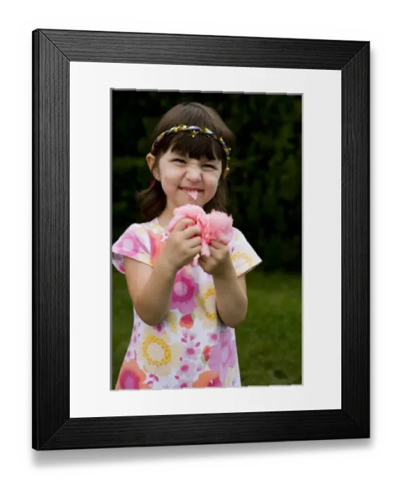 Framed Print : A young girl enjoying cotton candy Vermont USA (MR) Framed Print : A young girl enjoying cotton candy Vermont USA (MR)