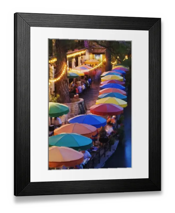 Framed Print : Colorful umbrellas of outdoor cafe along famous River Walk and San Antonio River Framed Print : Colorful umbrellas of outdoor cafe along famous River Walk and San Antonio River