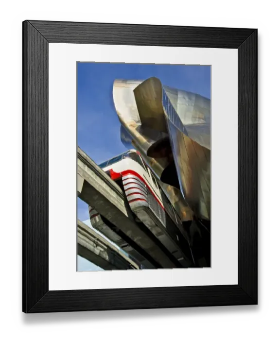 Framed Print : USA, Washington, Seattle. Monorail emerges from Experience Music Project building Framed Print : USA, Washington, Seattle. Monorail emerges from Experience Music Project building