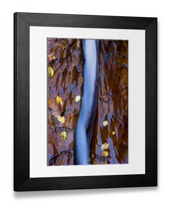 Framed Print : Water cuts a narrow channel through the red sandstone in the Left Fork of the Virgin