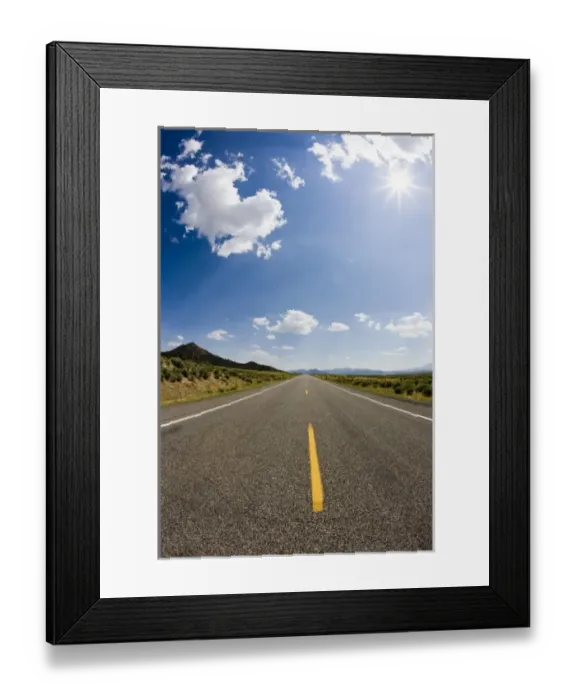 Framed Print : A two lane road extending into the distance of southwest Utah leading to the mountainous Framed Print : A two lane road extending into the distance of southwest Utah leading to the mountainous