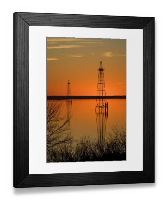 Framed Print : Oil well derricks in Lake Arrowhead near Wichita Falls, Texas, USA at sunset, winter Framed Print : Oil well derricks in Lake Arrowhead near Wichita Falls, Texas, USA at sunset, winter