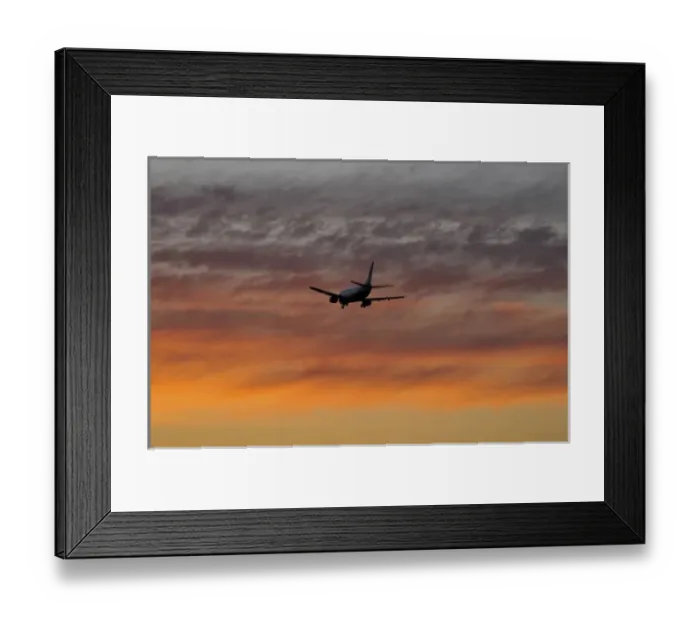 Framed Print : USA, Oregon, Portland. Airplane with landing gear down making a final approach to land at sunset Framed Print : USA, Oregon, Portland. Airplane with landing gear down making a final approach to land at sunset
