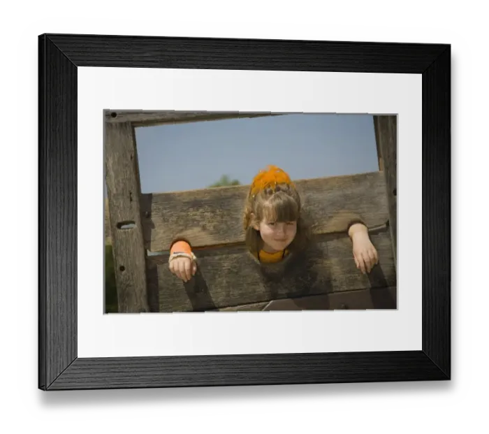 Framed Print : Girl (age 6) in stockade, Colonial Williamsburg Historic Area, Williamsburg, Virginia