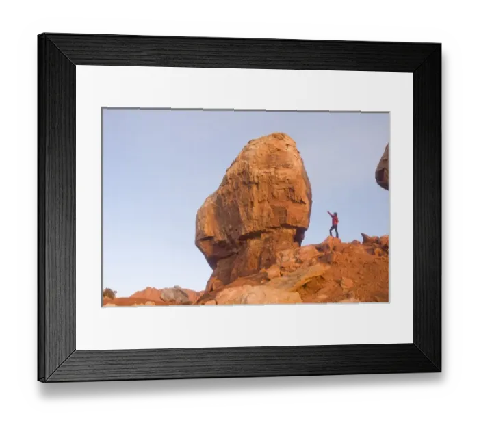 Framed Print : A tourist checks out one of the Twins rock formation in Capitol Reef National Park Framed Print : A tourist checks out one of the Twins rock formation in Capitol Reef National Park