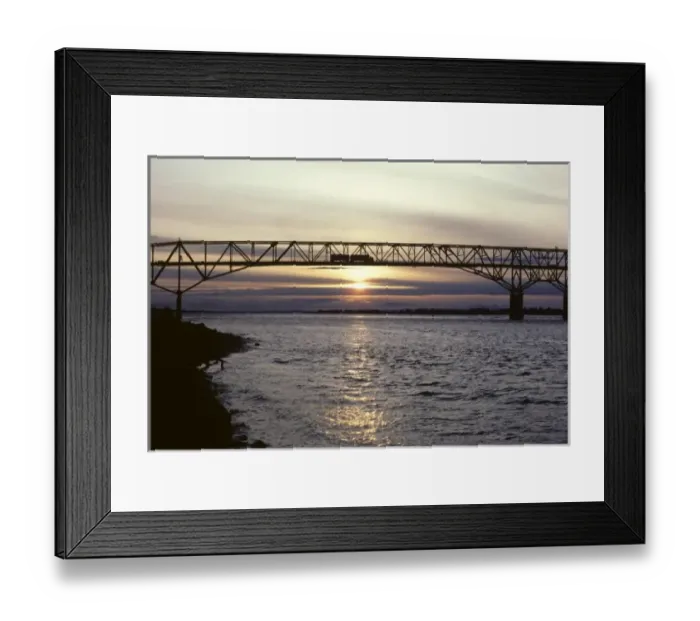 Framed Print : A truck crosses the Umatilla Bridge made of steel trusses over the Columbia River between Oregon