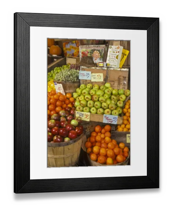 Framed Print : Assortment of apples and oranges in old fashion style display at grocery store. North America Framed Print : Assortment of apples and oranges in old fashion style display at grocery store. North America