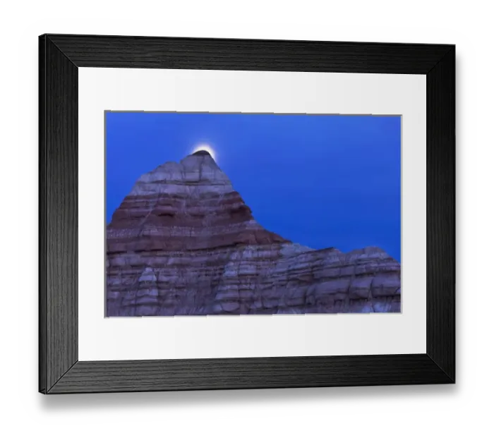 Framed Print : Full moon rises over colorful badlands in the Grand Staircase Escalante National Monument in Utah
