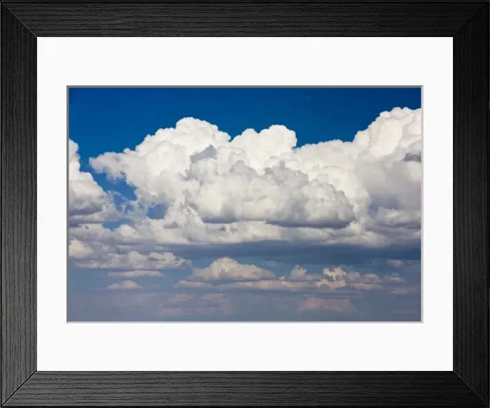 Framed Print : Cumulus clouds extend into the distance above Utah mountains in the southwest Framed Print : Cumulus clouds extend into the distance above Utah mountains in the southwest