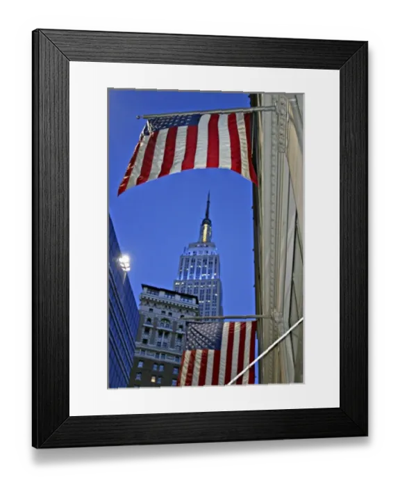 Framed Print : Empire State Building framed by American flag at dusk New York City