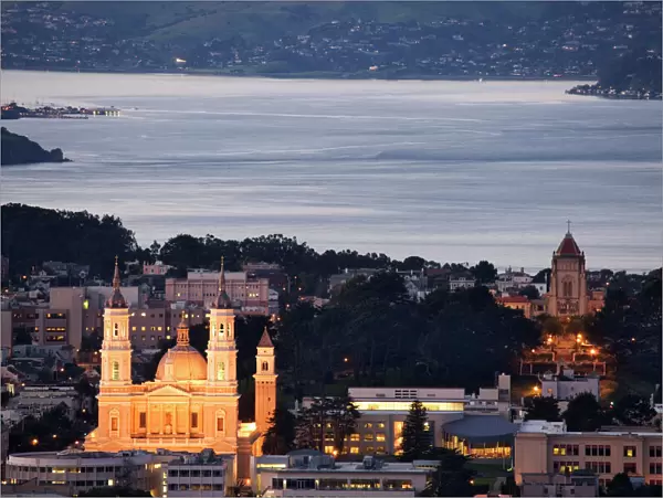 USA, California, San Francisco. Aerial view of St. Ignatius Church lit at twilight