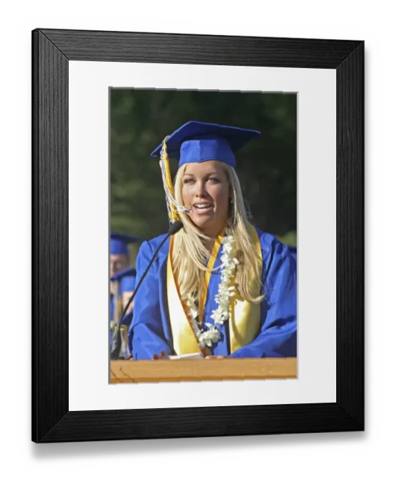 Framed Print : Released high school female graduate valedictorian speaks at outdoor ceremony Mt