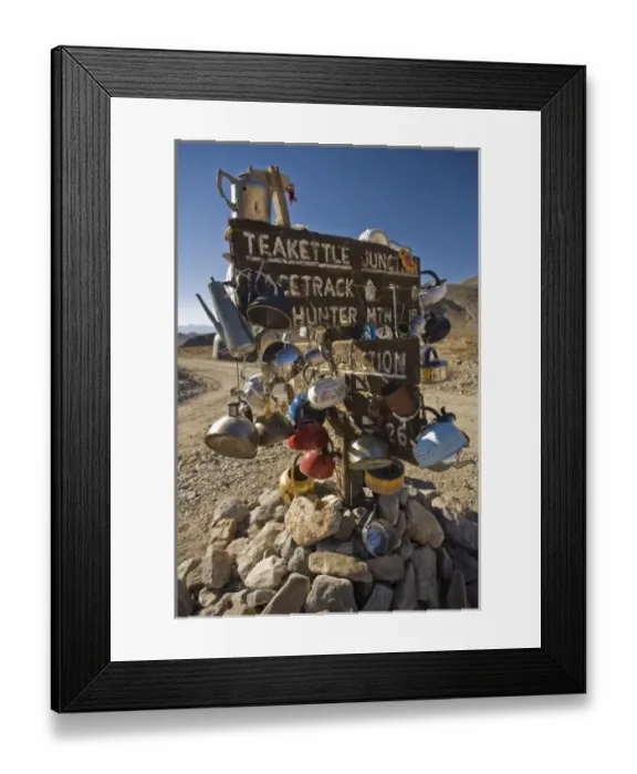 Framed Print : USA, California, Death Valley National Park. Teakettle Junction sign loaded with tea kettles Framed Print : USA, California, Death Valley National Park. Teakettle Junction sign loaded with tea kettles