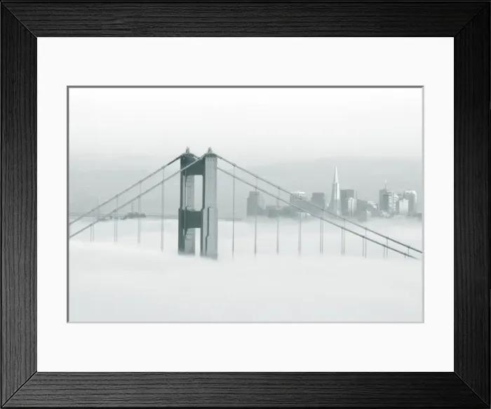 Framed Print : Fog rolls through the San Francisco bay covering the Golden Gate Bridge and city Framed Print : Fog rolls through the San Francisco bay covering the Golden Gate Bridge and city