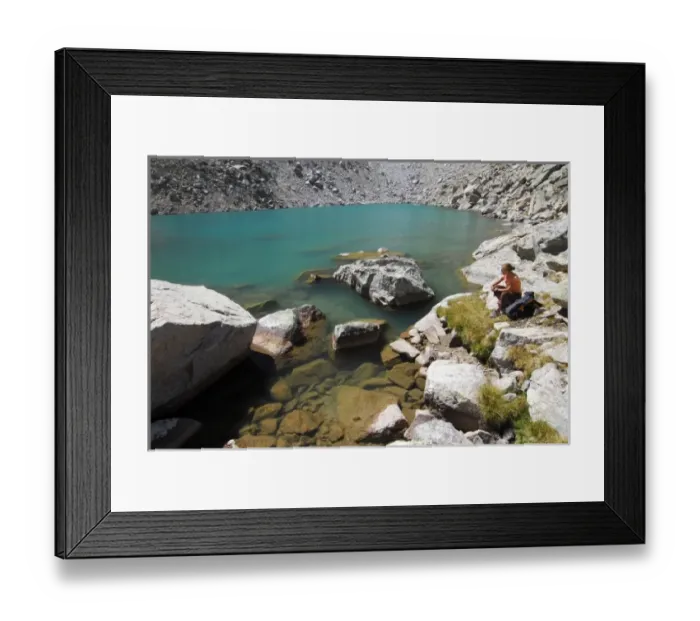 Framed Print : USA, Colorado, Rocky Mountains, Indian Peaks Wilderness. A female hiker rests beside Framed Print : USA, Colorado, Rocky Mountains, Indian Peaks Wilderness. A female hiker rests beside