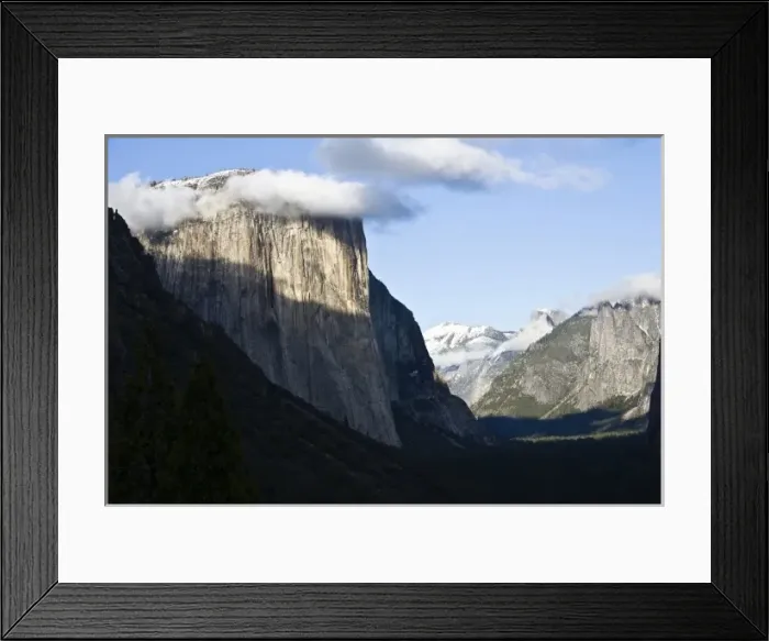 Framed Print : Clouds form around the peak of El Capitan as afternoon light paints Yosemite Valley Framed Print : Clouds form around the peak of El Capitan as afternoon light paints Yosemite Valley