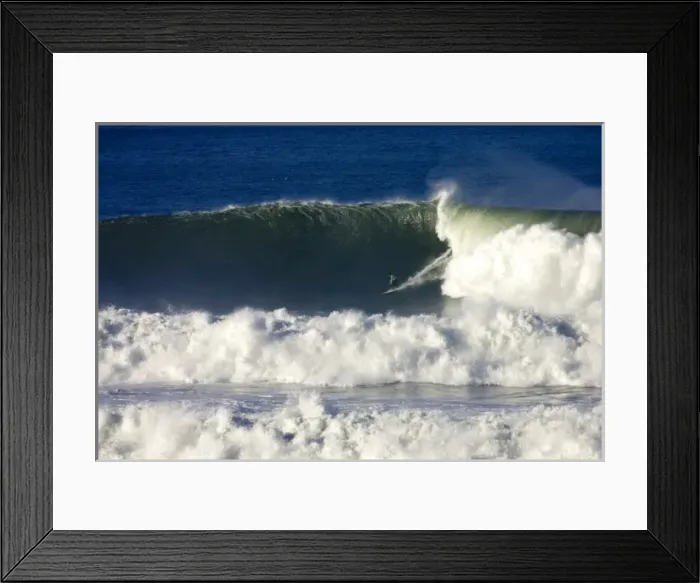 Framed Print : A surfer braves the gigantic surf at the Mavericks Big Wave Surf Competition in Northern Framed Print : A surfer braves the gigantic surf at the Mavericks Big Wave Surf Competition in Northern
