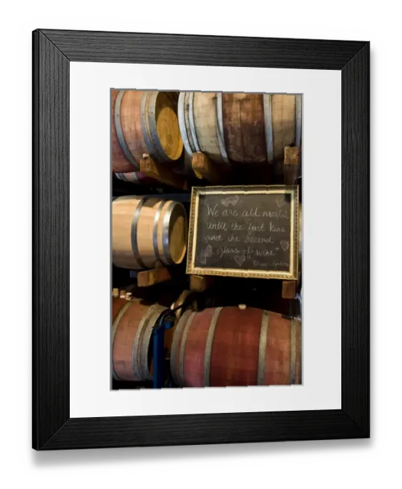 Framed Print : USA, California, Napa Valley. An Eduardo Galeano quote on a chalkboard among wooden barrels of wine Framed Print : USA, California, Napa Valley. An Eduardo Galeano quote on a chalkboard among wooden barrels of wine