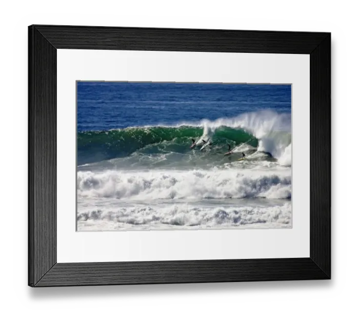 Framed Print : Four surfers catch a wave at the 2006 Mavericks big wave surf competition near Half
