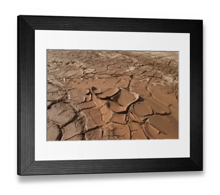 Framed Print : Cracked mud in desert during drought, Navajo reservation, near Seba Dalkai, Arizona Framed Print : Cracked mud in desert during drought, Navajo reservation, near Seba Dalkai, Arizona