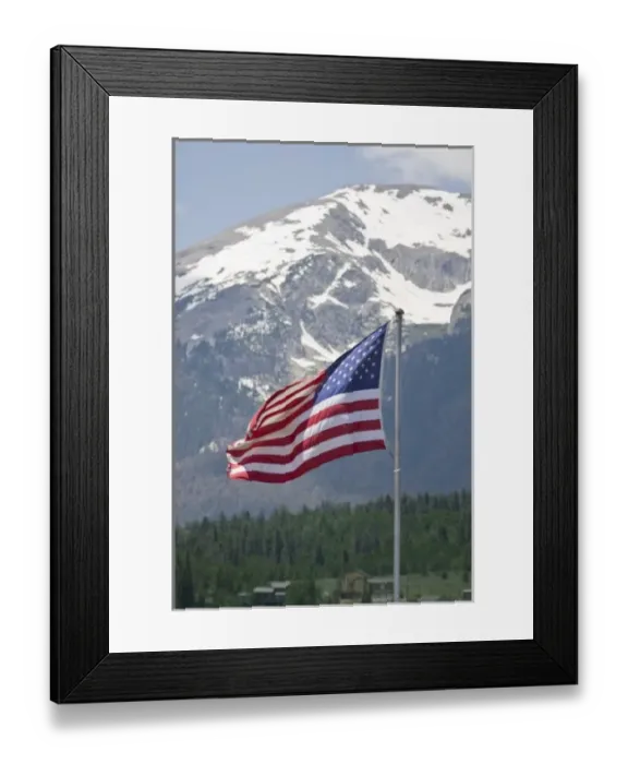 Framed Print : USA, Colorado, Silverthorne. American flag flying against mountain backdropFred J