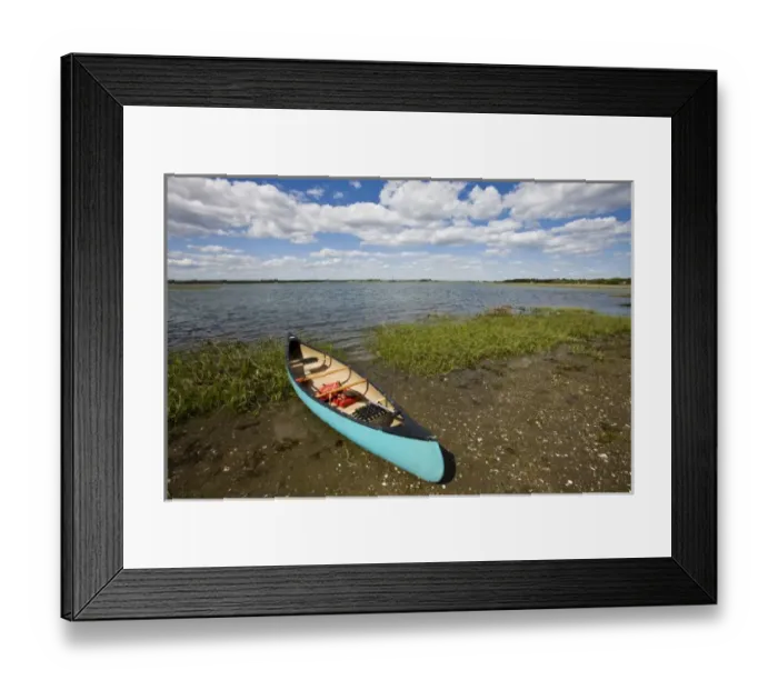 Framed Print : A canoe on the salt marsh side of Long Beach in Stratford, Connecticut. This body