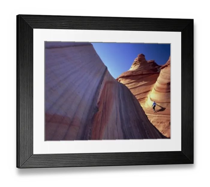 Framed Print : Vermillion Cliffs National Monument, Arizona. USA. Hiker on cross-bedded sandstone Framed Print : Vermillion Cliffs National Monument, Arizona. USA. Hiker on cross-bedded sandstone