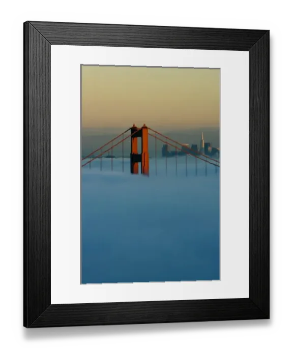 Framed Print : Fog rolls through the San Francisco bay covering the Golden Gate Bridge and city
