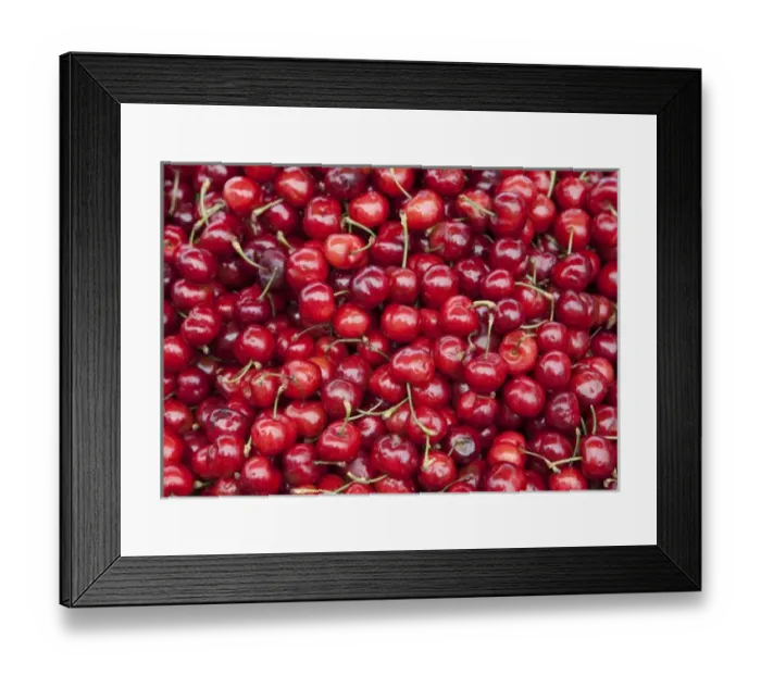 Framed Print : Fresh ripe cherries on display at market