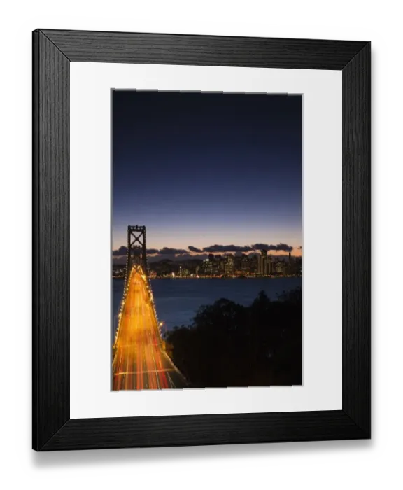 Framed Print : USA, California, San Francisco, Bay Bridge and city skyline from Treasure Island, dusk