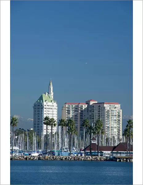 California, Long Beach. Skyline views of the port & marina area of Long Beach. Snow-capped