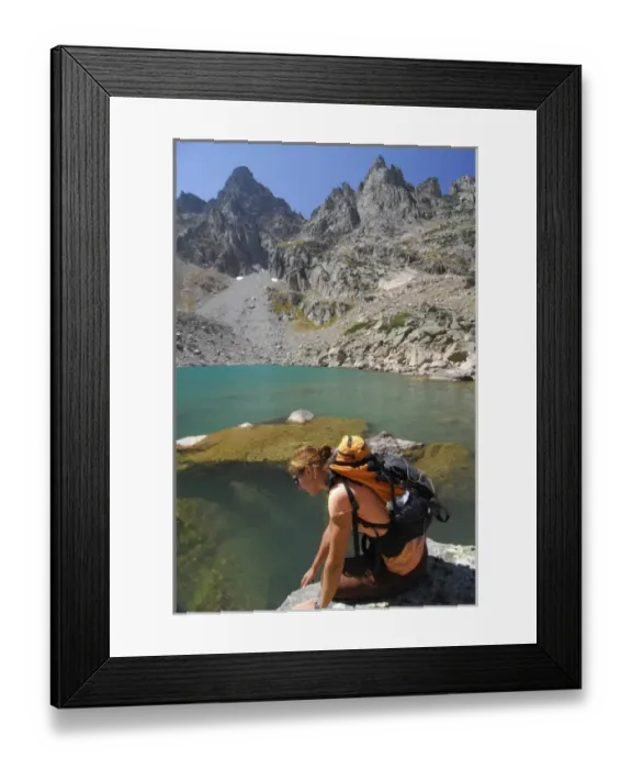 Framed Print : USA, Colorado, Rocky Mountains, Indian Peaks Wilderness. A female hiker looks into