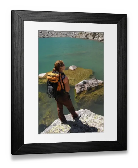 Framed Print : USA, Colorado, Rocky Mountains, Indian Peaks Wilderness. A female hiker at a mountain lake Framed Print : USA, Colorado, Rocky Mountains, Indian Peaks Wilderness. A female hiker at a mountain lake