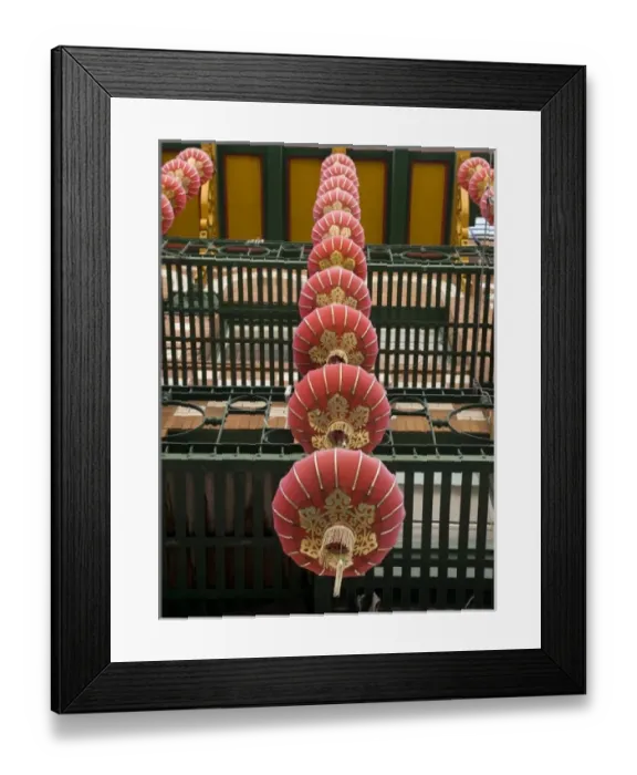 Framed Print : USA, California, San Francisco. Strings of red Chinese lanterns hanging from a balcony