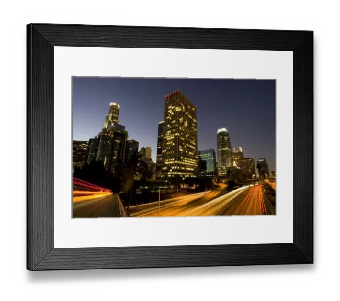 Framed Print : First light from sunrise illuminates downtown Los Angeles wih traffic streaking across Framed Print : First light from sunrise illuminates downtown Los Angeles wih traffic streaking across