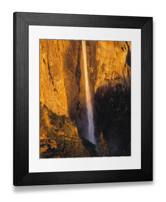 Framed Print : USA, California, Yosemite NP. Bridal Veil Falls follows a narrow path down the valley Framed Print : USA, California, Yosemite NP. Bridal Veil Falls follows a narrow path down the valley
