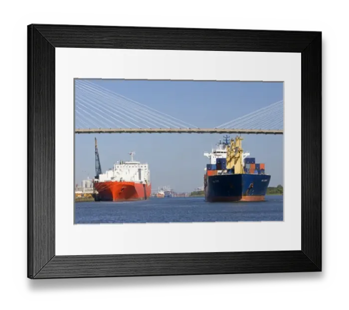 Framed Print : Container ships pass under the Talmadge Memorial Bridge at the Port of Savannah in Savannah Framed Print : Container ships pass under the Talmadge Memorial Bridge at the Port of Savannah in Savannah