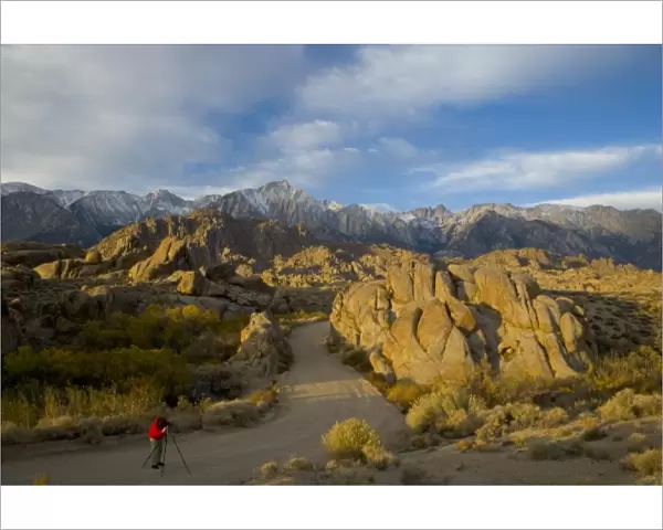 Photographer in the Roadway Alabama Hills California with a backdrop of the Eastern