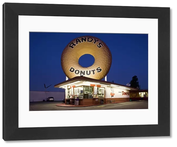 USA, California, Inglewood. Randys Donuts, dawn