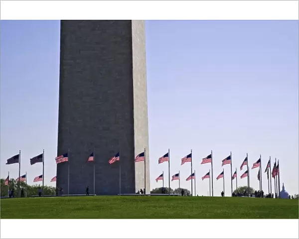 USA, Washington, D. C. Fifty American flags surround the Washington Monument