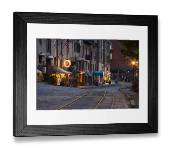 Framed Print : USA, Georgia, Savannah. Scenic view of the cobblestone River Street at night in