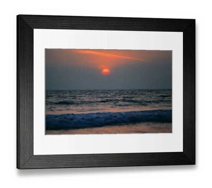 Framed Print : USA, California, Los Angeles Co. The setting sun, muted red, drops into the waves Framed Print : USA, California, Los Angeles Co. The setting sun, muted red, drops into the waves