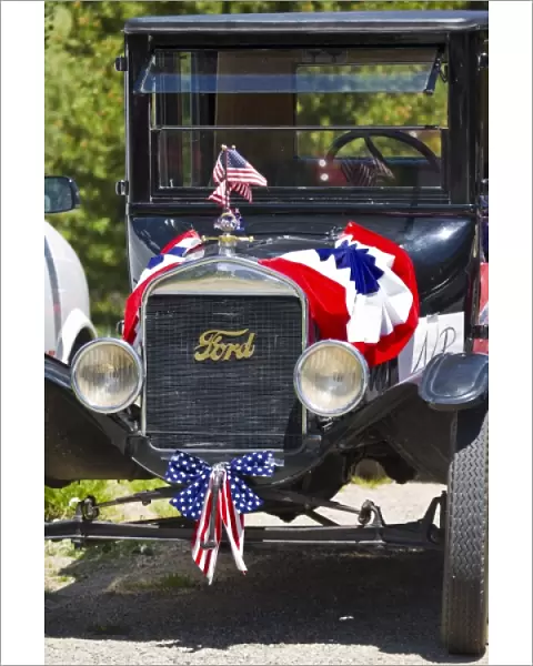 USA, Colorado, Frisco. Vintage Ford passenger car decorated for July Fourth paradeFred J