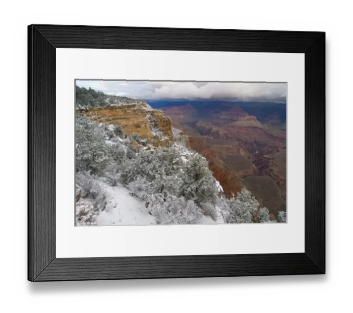 Framed Print : Scenic snowy winter landscape along the south rim of the majestic Grand Canyon at sunrise Framed Print : Scenic snowy winter landscape along the south rim of the majestic Grand Canyon at sunrise
