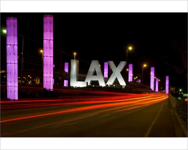 USA, California, Los Angeles. Blurred traffic lights at entrance to airport
