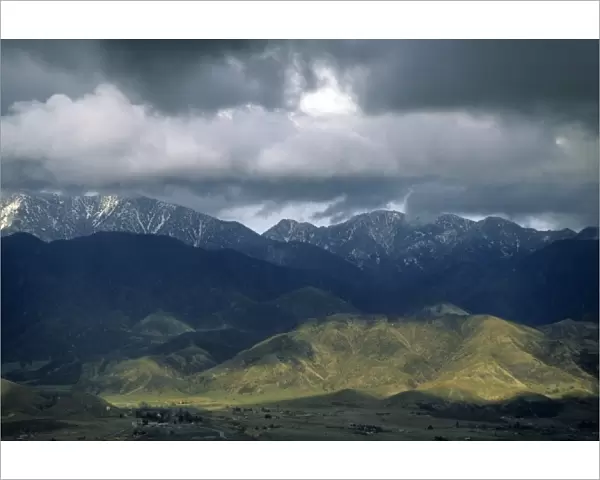 California: San Bernardino Mountains, looking across San Jancinto Mountains at stormy sky
