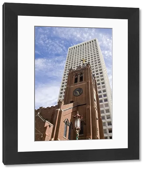 USA, California, San Francisco. Old St. Marys Cathedral and modern skyscraper
