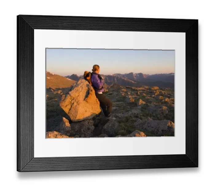 Framed Print : USA, Colorado, Rocky Mountain NP. A female hiker leans against a boulder on teh Longs Peak trail Framed Print : USA, Colorado, Rocky Mountain NP. A female hiker leans against a boulder on teh Longs Peak trail