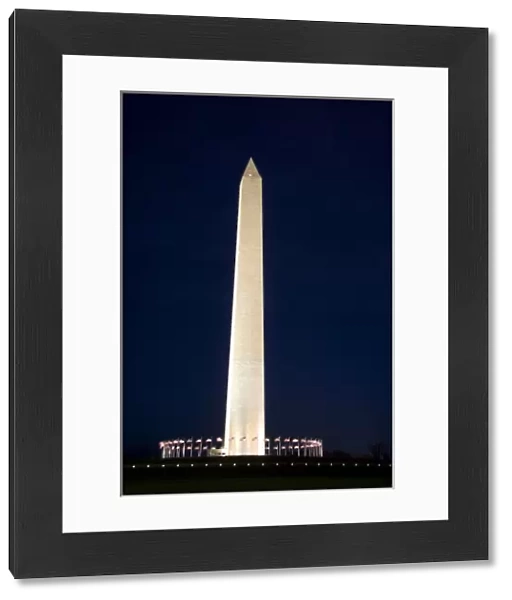 The Washington Monument lit up at night in Washington, D. C
