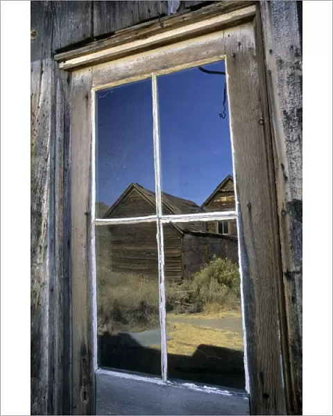 USA, California, reflection in old mining town of Bodie